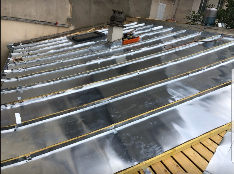 Pose d'une couverture sur toiture par BK Renov 91